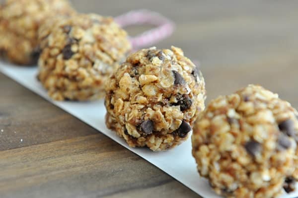 Chocolate chip granola bites lined up in a row.