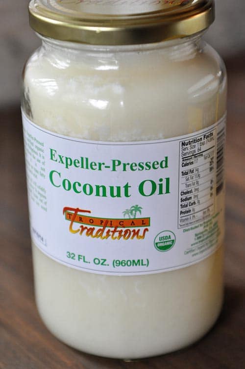 glass jar of expeller-pressed coconut oil