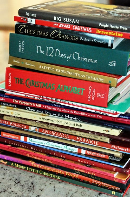 a stack of Christmas books