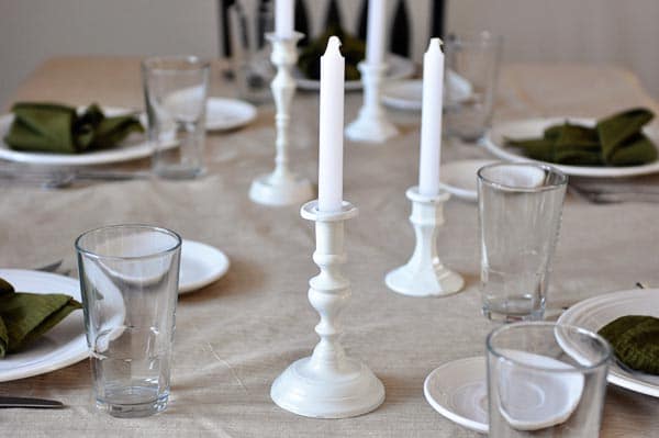 a table set up with a nice candelit dinner setup