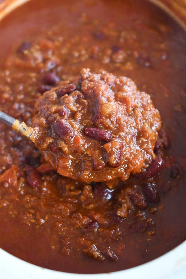 Ladle of classic slow cooker chili.