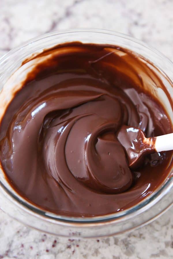 Glass bowl of chocolate ganache.