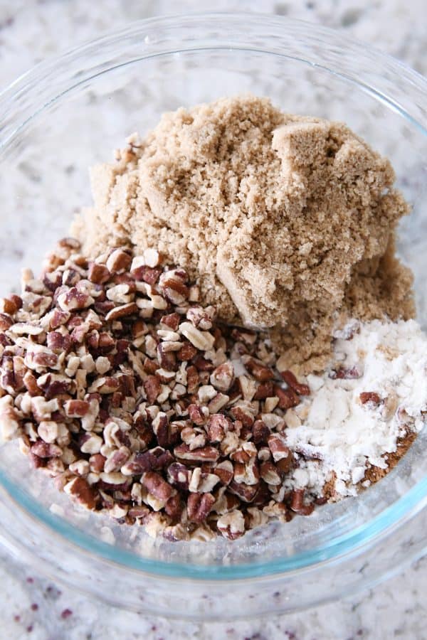 Chocolate chip streusel ingredients in a large glass bowl.