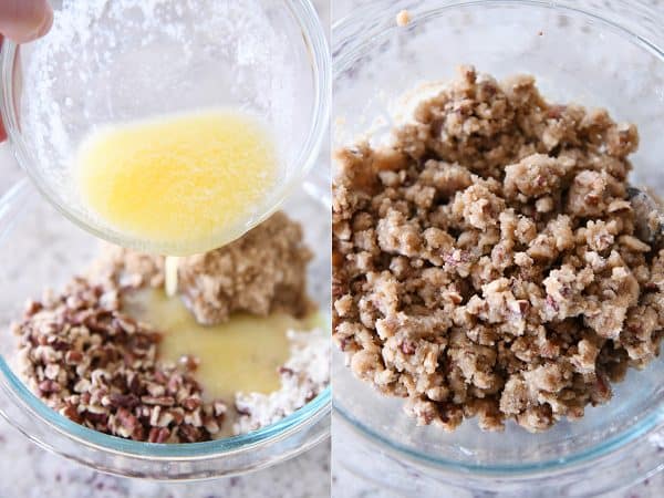 Melted butter getting poured into a bowl of streusel ingredients.