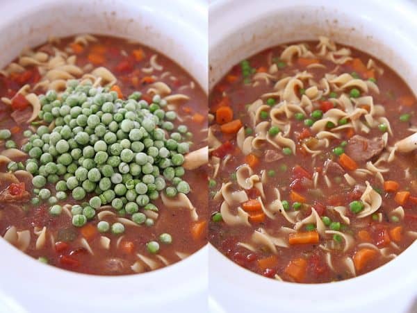 Adding frozen peas to slow cooker beef vegetable noodle soup.