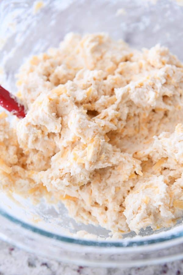 Mixed dough for cheesy garlic drop biscuits.