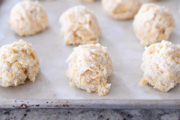 Unbaked cheesy garlic drop biscuit.