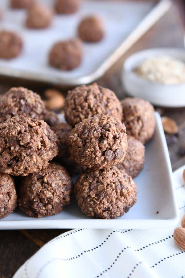 Chocolate Peanut Butter Granola Bites on a white tray. 