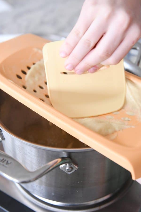 Cooking homemade spaetzle.