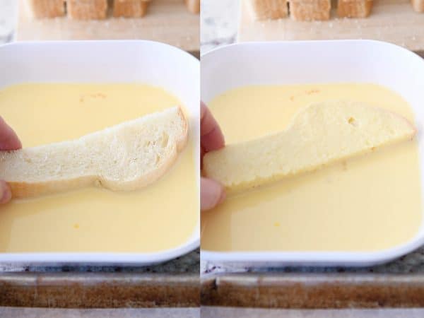 Dipping bread in egg mixture for crunchy baked french toast sticks.