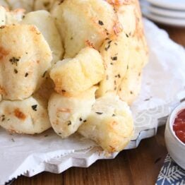 buttery garlic + herb pull-apart bubble bread with pieces on the side