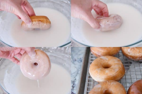 Dipping fried donuts in glaze.