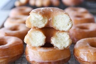 the best homemade glazed donuts with one broken in half