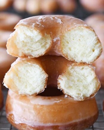 the best homemade glazed donuts with one broken in half