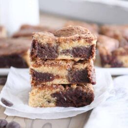 snickerdoodle brookie bars stacked on top of each other
