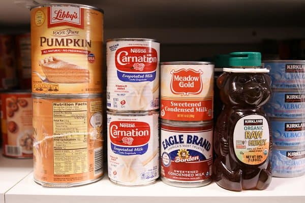 honey and canned goods on pantry shelves