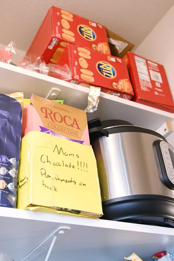 ritz crackers and food on pantry shelves