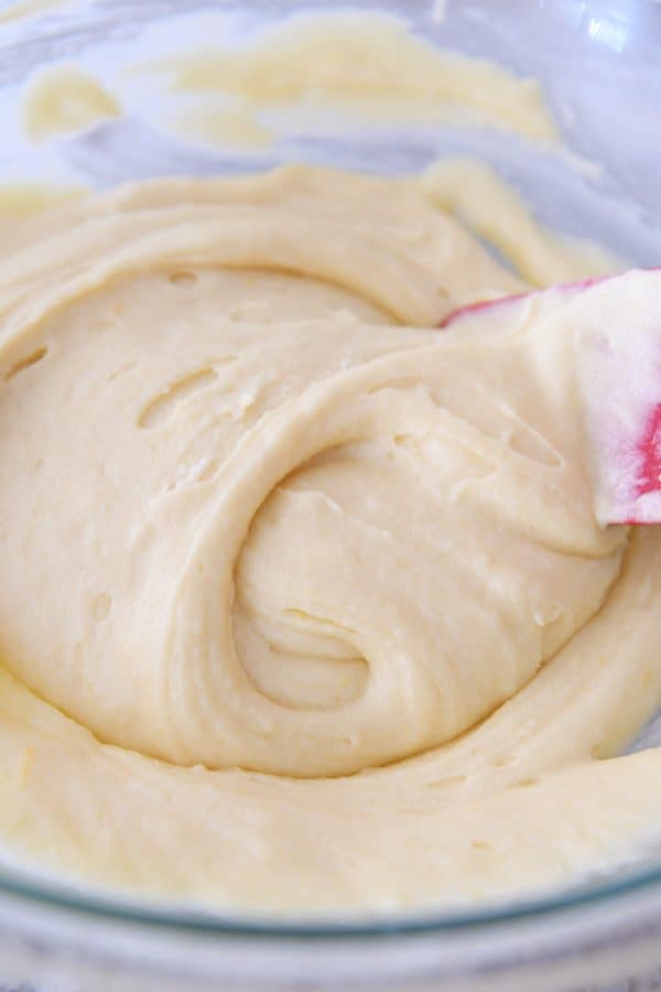 Swirl of vanilla cake batter in glass bowl.