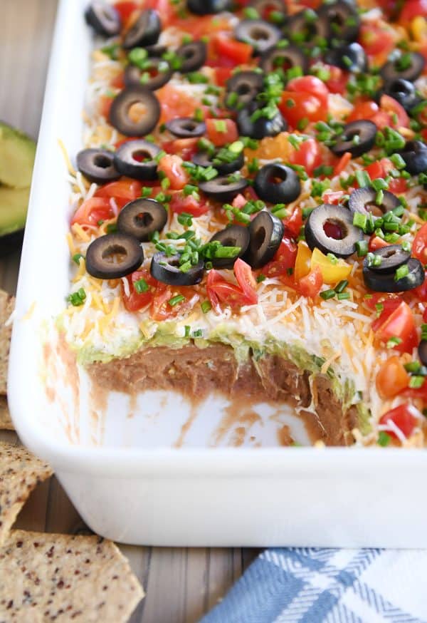 scoop taken out of 7-layer dip to show all the layers