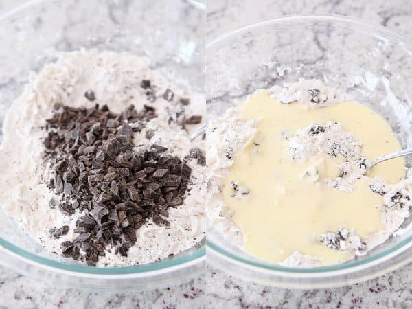 Adding chocolate chunks and wet ingredients to biscuit dough.