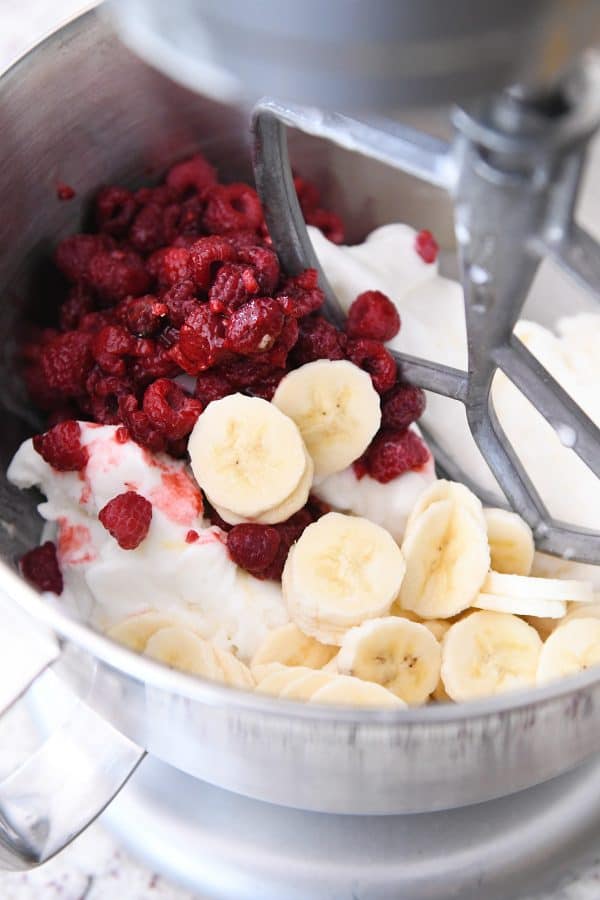 mixing pineapple sherbet, bananas, raspberries in kitchen aid mixer