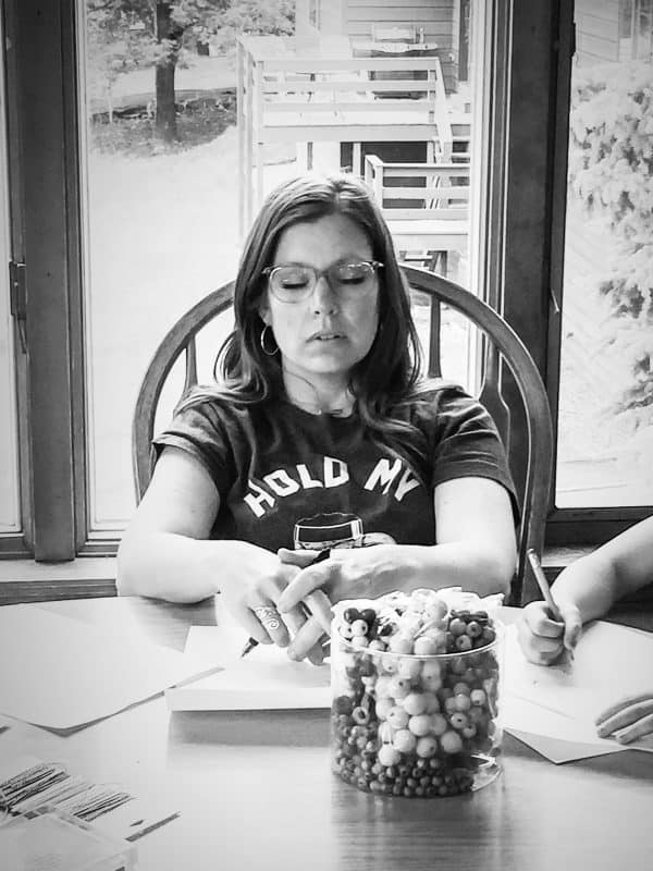 mom asleep in chair at kitchen table