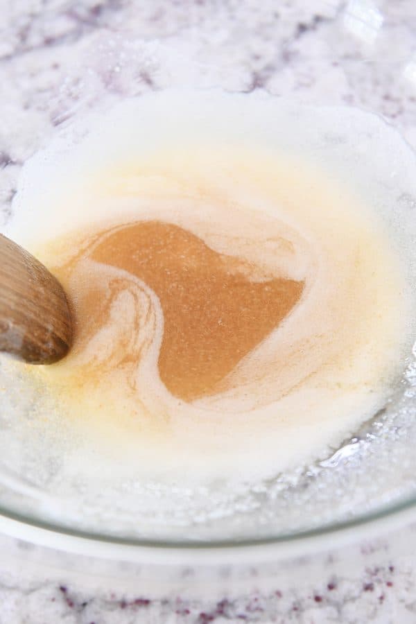 Glass bowl with brown butter.