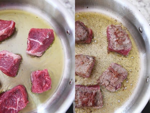 Browning beef in hot oil in skillet.