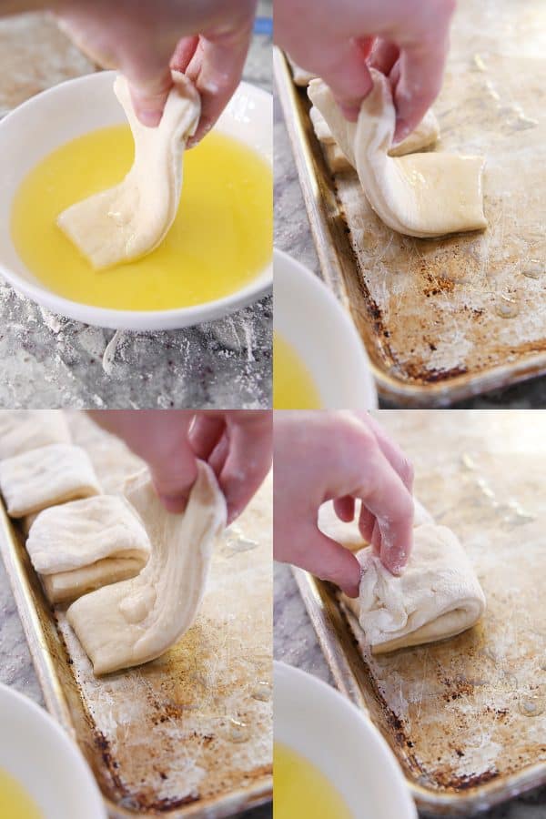 dipping roll dough in butter, folding roll dough in half on sheet pan