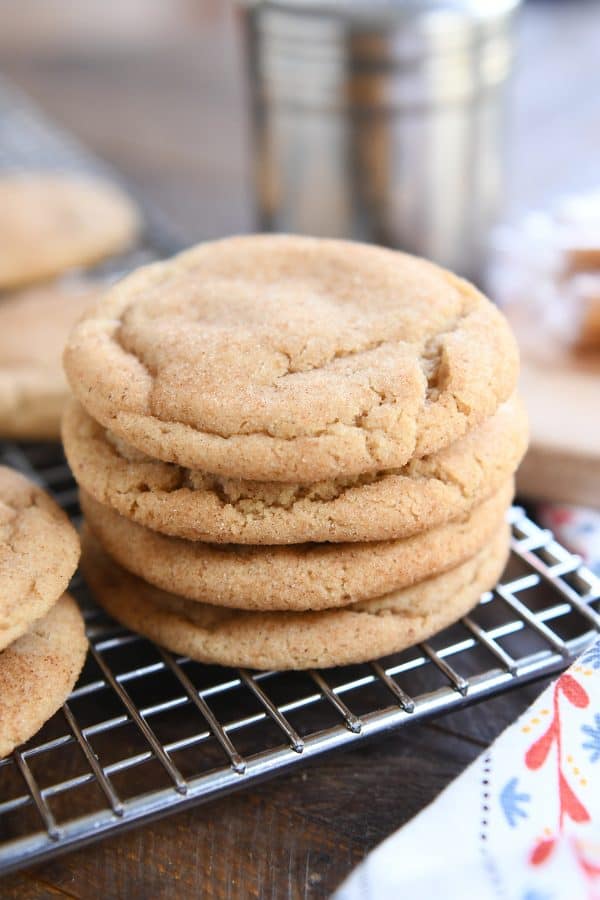 Stack of brown butter caramel snickerdoodles on cooling rack.