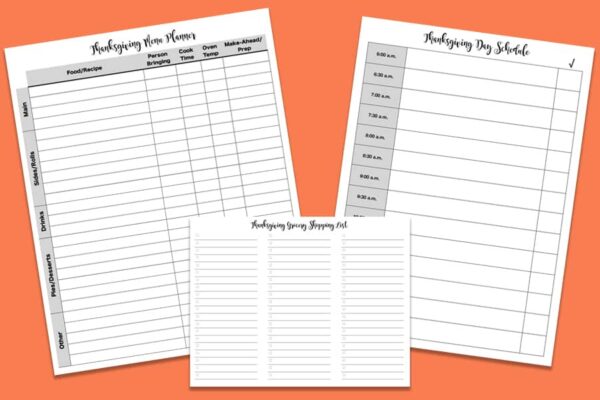 white Thanksgiving menu planners and spreadsheets on orange background
