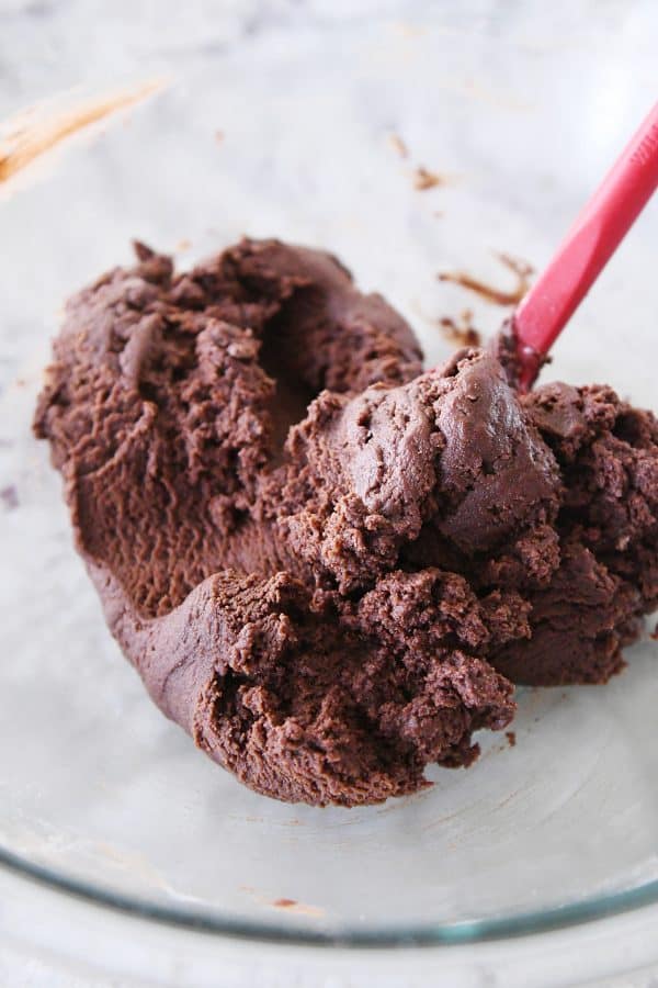 chocolate shortbread dough in glass bowl