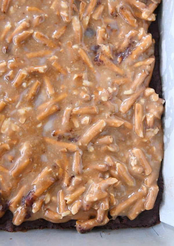 pretzel caramel on top of chocolate shortbread in 9X13-inch pan