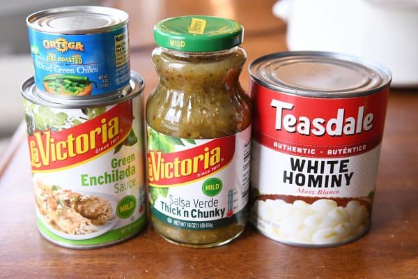 Can of green enchilada sauce, can of green chiles, can of salsa verde thick and chunky, can of white hominy.