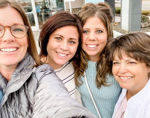 four women taking selfie