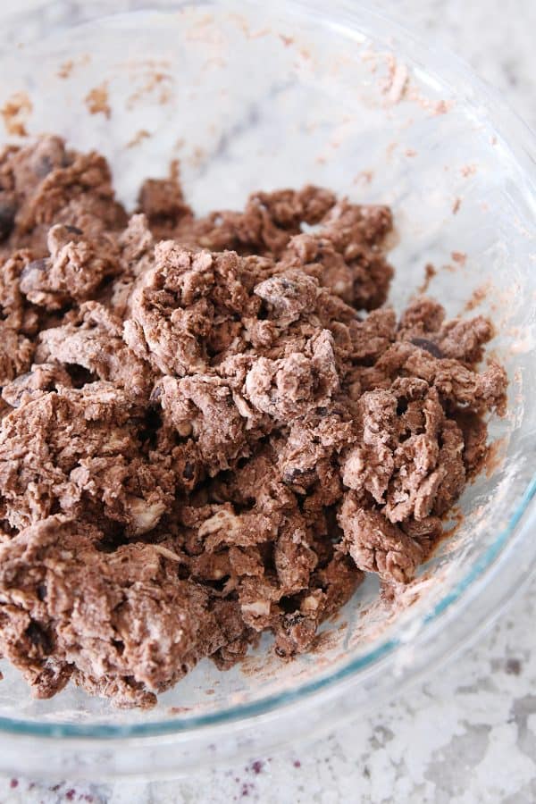 Mixed chocolate scone dough in glass bowl.