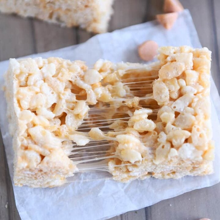 Crispy Butterscotch rice rolled out halves on white parchment paper