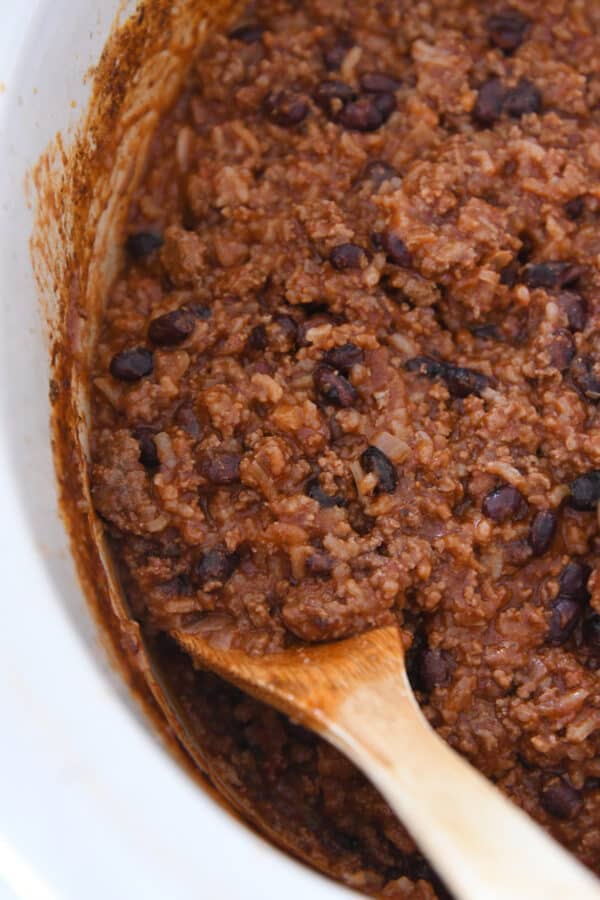 Crockpot of rice and taco meat for floating taco bowls recipe.