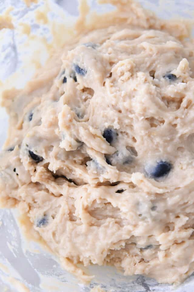 Mixture in a glass bowl for blueberry bread