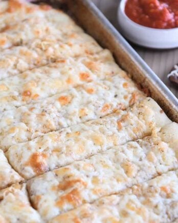 sheet pan of easy cheesy breadsticks