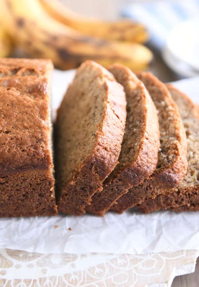Side view of three slices of sourdough banana bread.