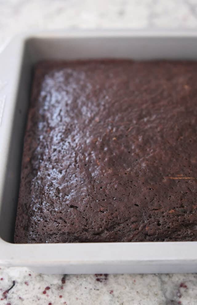 baked chocolate zucchini cake in metal 9X13-inch pan