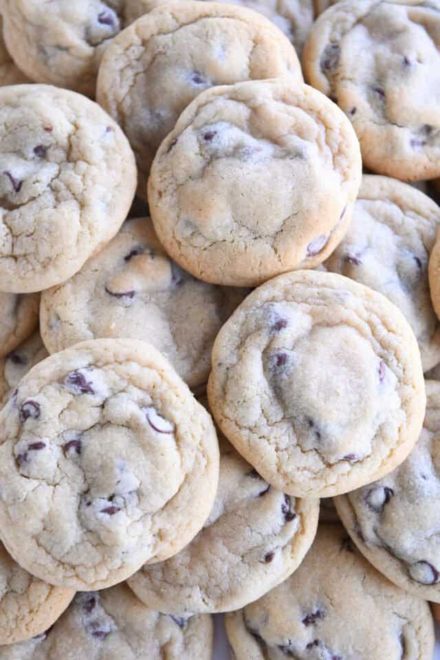 Huge pile of super soft chocolate chip cookies.