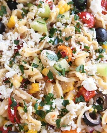 Close up view of Greek pasta salad.