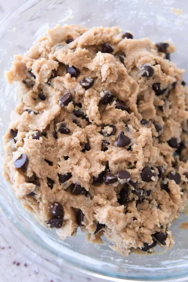 Glass bowl with chocolate chip cookie dough.