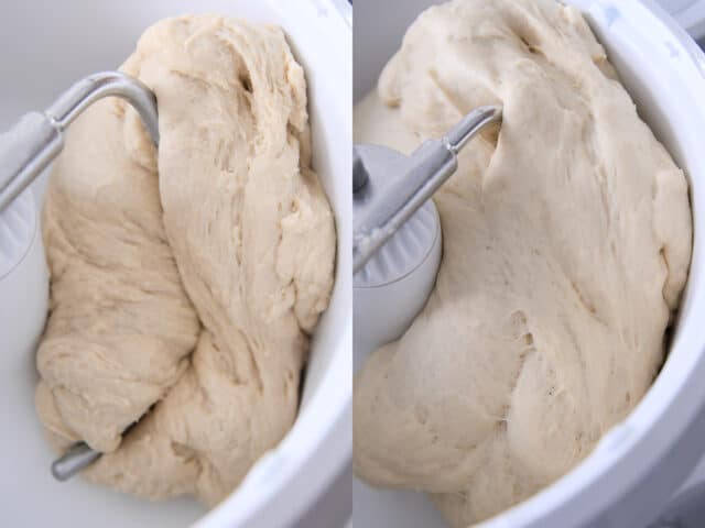 Soft dinner roll dough rising in white mixer bowl with dough hook.