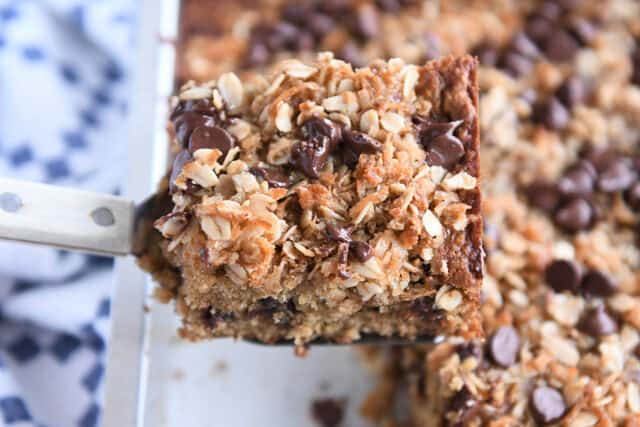 Square piece of banana oat snack cake on spatula.