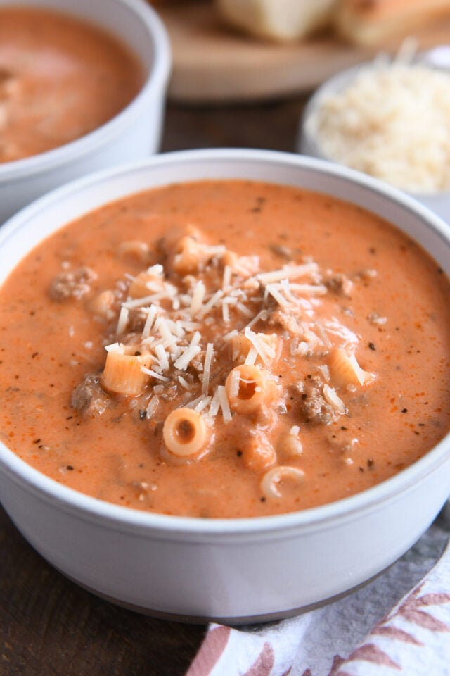 Bowl with noodles, ground beef, tomato soup and cheese.