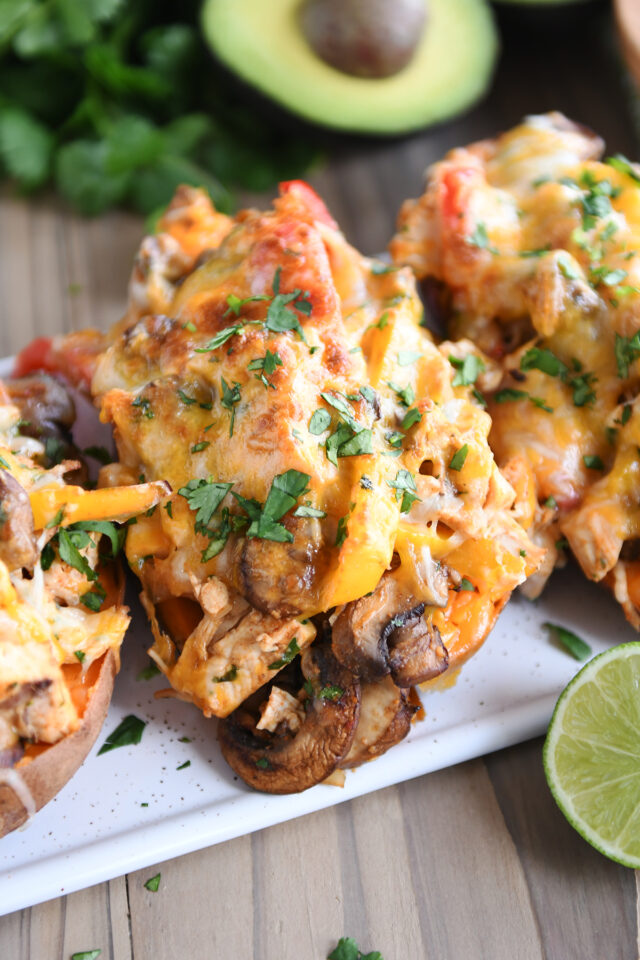 Mushrooms and bell peppers and broiled cheese on sweet potatoes.