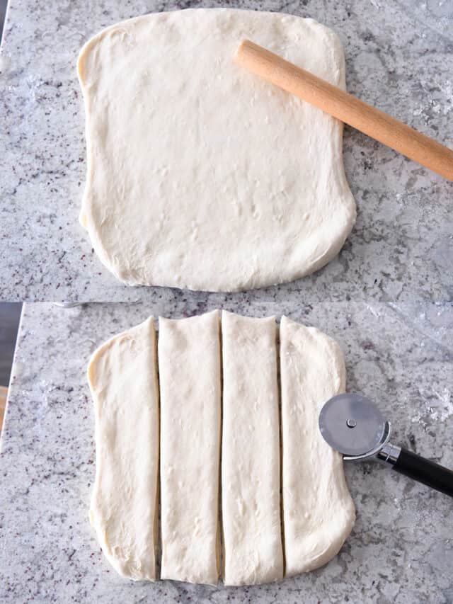 Rolled out dough cut into four strips with pizza cutter.